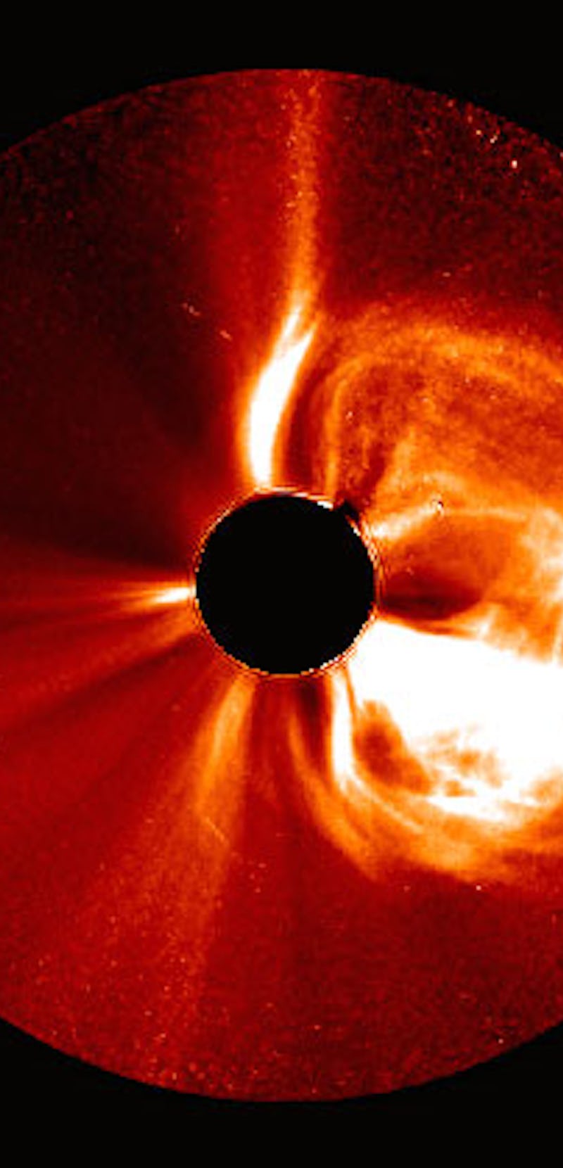 A large Solar eruption with a black center-part