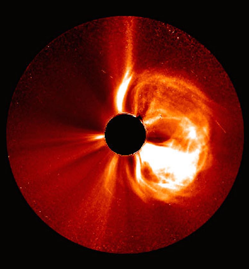 A large Solar eruption with a black center-part
