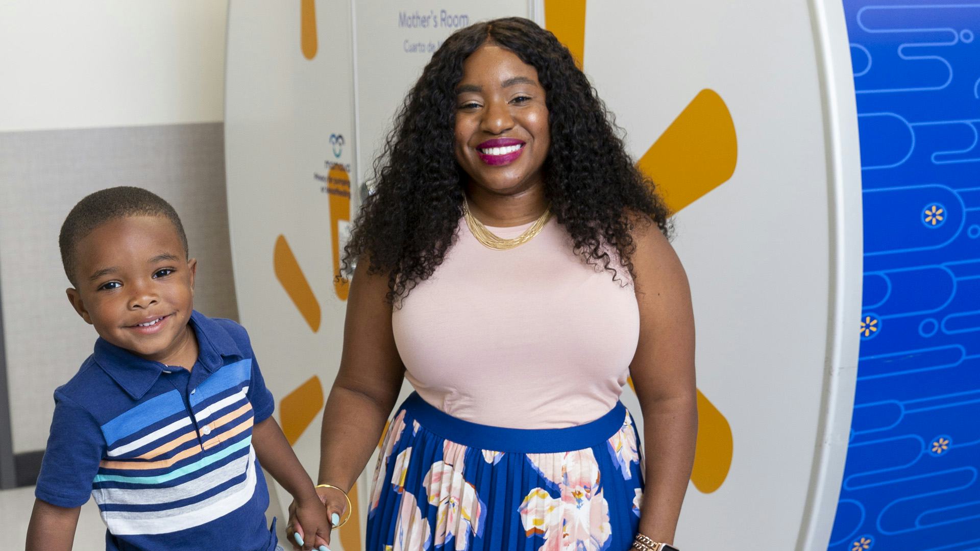tennille webb and her son in front of walmart pod