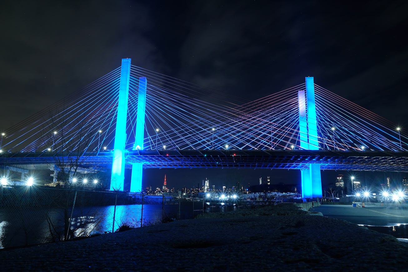 The Kosciuszko Bridge is illuminated in blue as part of the #LightItBlue for Health Workers movement...