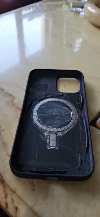 An alleged iPhone 12 case can be seen carrying a magnetic coil in the center. It appears to be place...