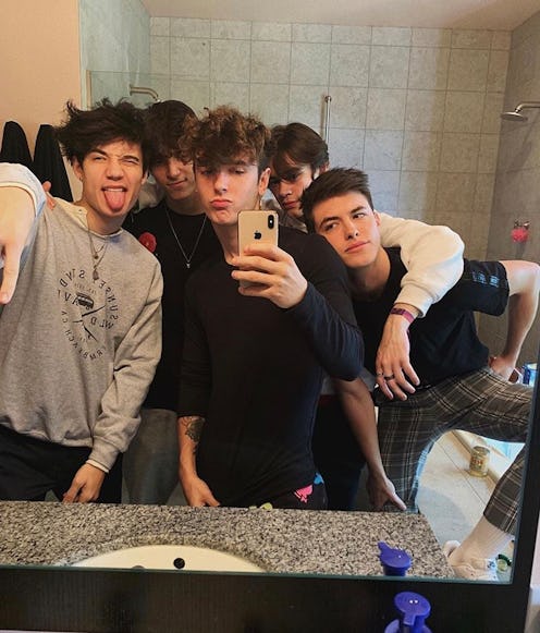 Bryce Hall and other members of the hype house take a mirror selfie. Here's the meaning of no cap on...