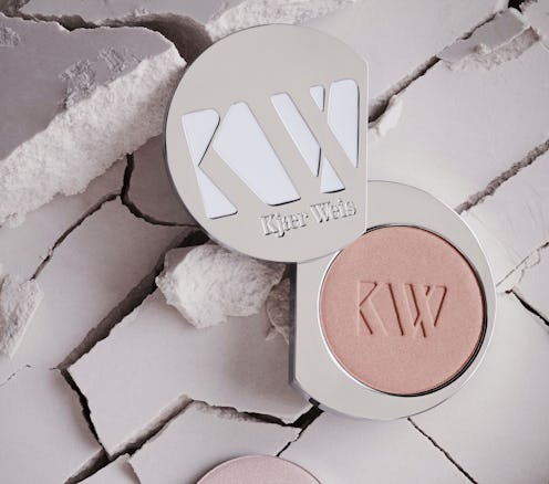 Kjaer Weis' new LighSlip Powder Highlighter mimics the effect of natural light beams on your face