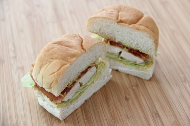 Chicken sandwich on a roll cut in half