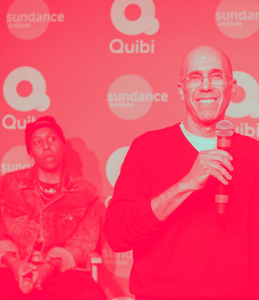 Jeffrey Katzenberg holding up a phone running Quibi.