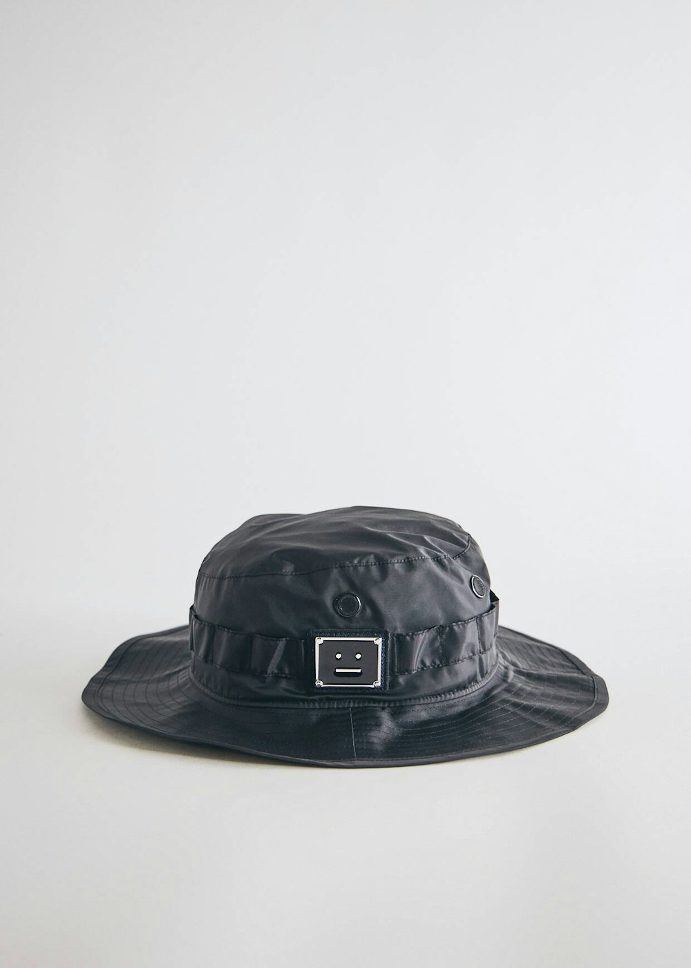 Brimm Plaque Face Hat in Black