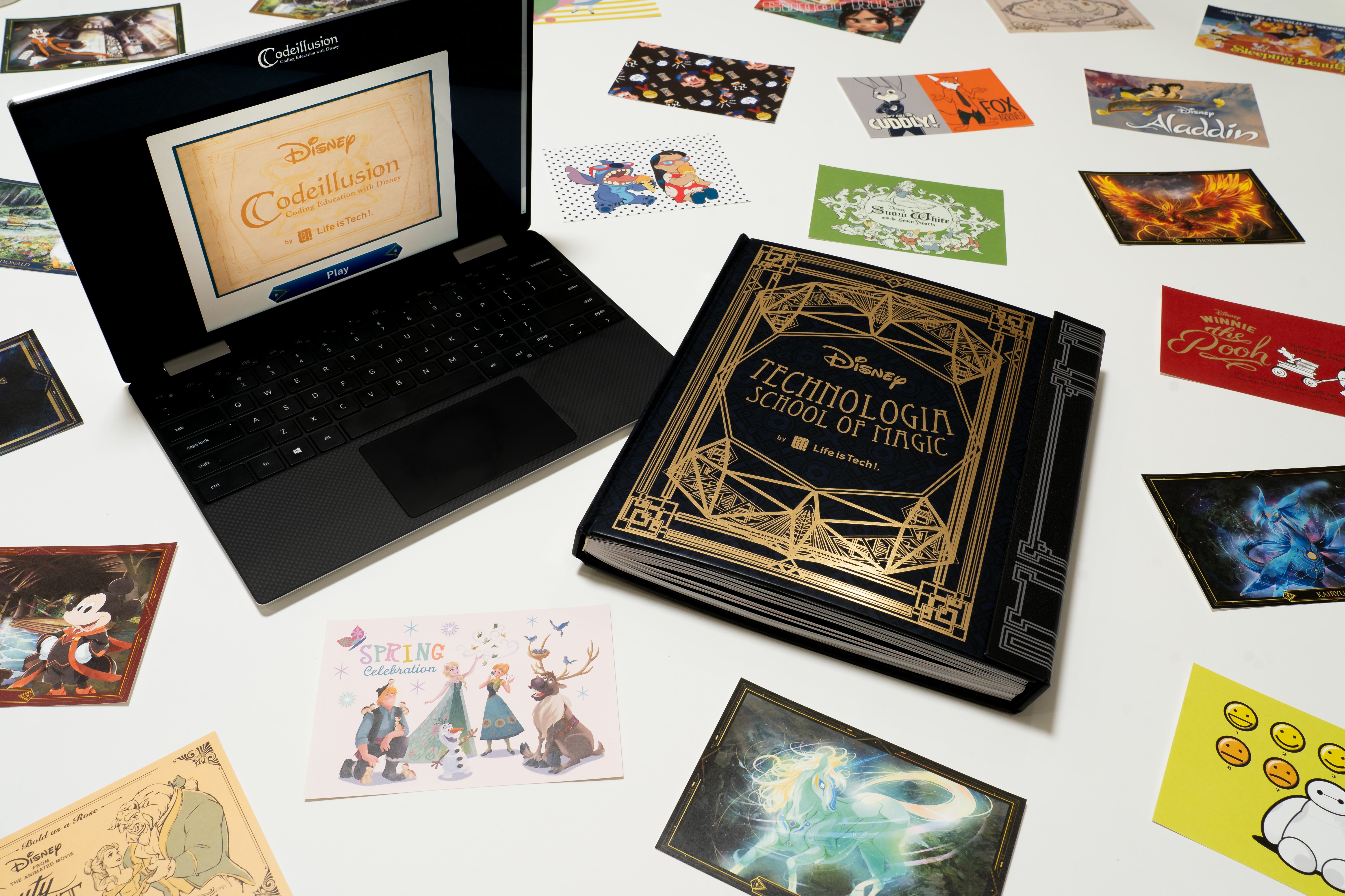 Promo image for Disney's Codeillusion product; laptop, Codeillusion book, and famous movie postcards...