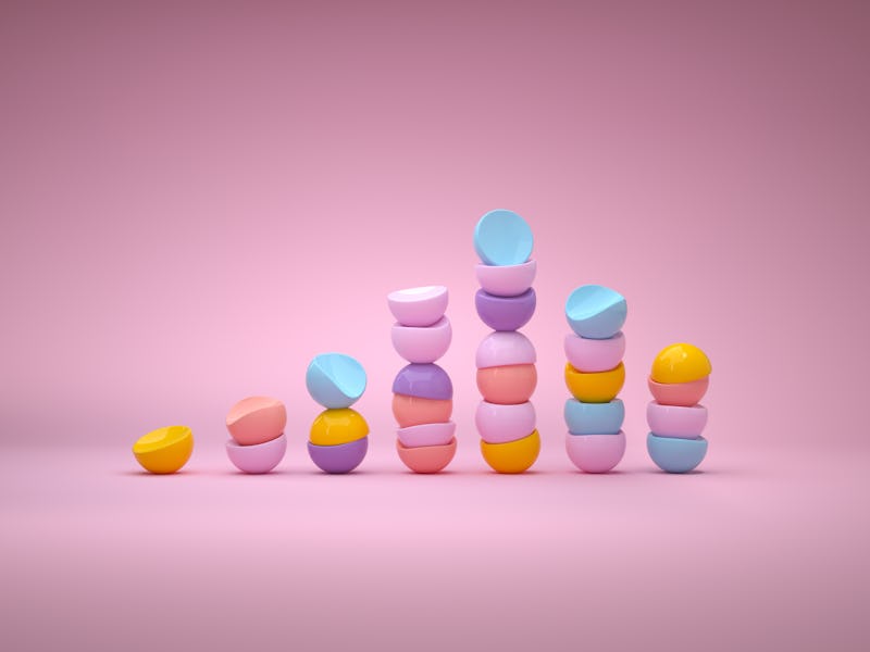 Digital generated image of abstract multi colored hemispheres making line chart on pink background.