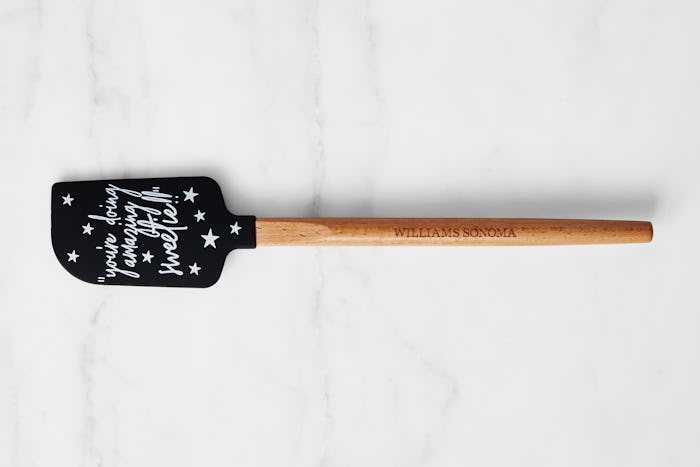 Black spatula with Kris Jenner quote, "you're doing amazing, Sweetie"