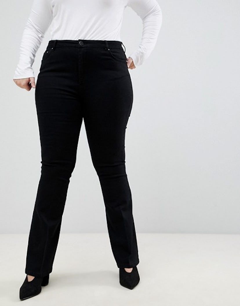 Curve bell flare jeans in clean black with pressed crease