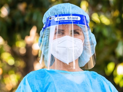 Hospital worker wearing a face shield.