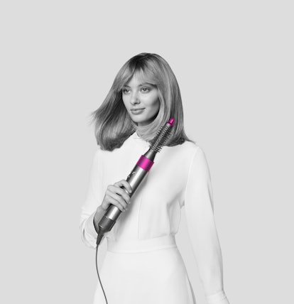 Dyson's new Airwrap attachments used on model.