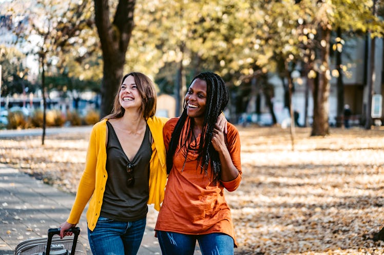 Young friends walking in autumn