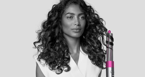Dyson's new Airwrap attachments used on model.