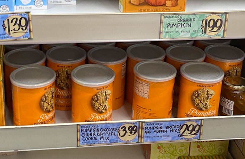 An image of oatmeal tins full of pumpkin chocolate chip cookie mix.