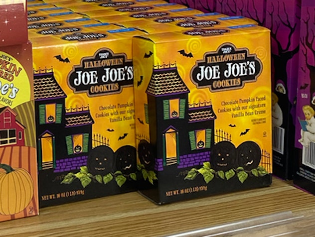 Boxes of Halloween cookies on a shelf.