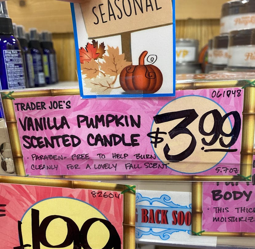 An image of a purple price tag for pumpkin candles reading $4. 