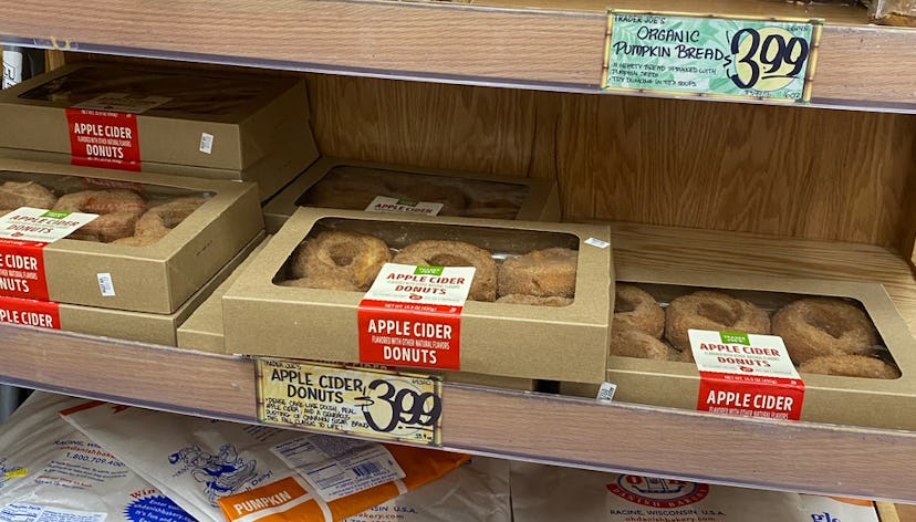 An image of apple cider donuts on a shelf. 