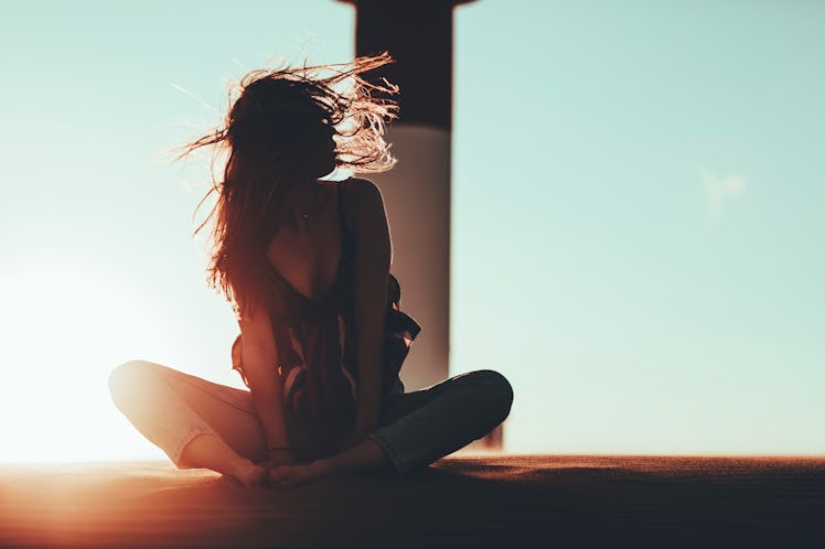 Young woman with wind in her hair
