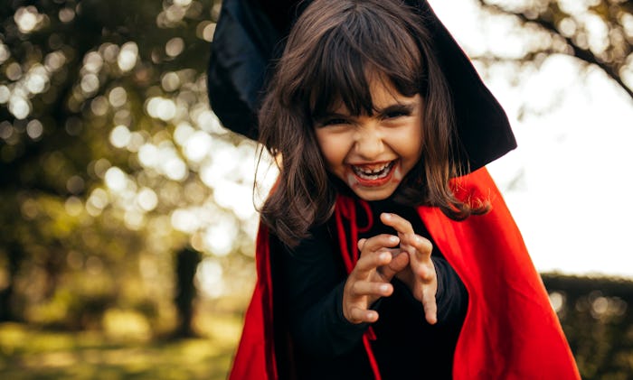 little girl dressed up as vampire