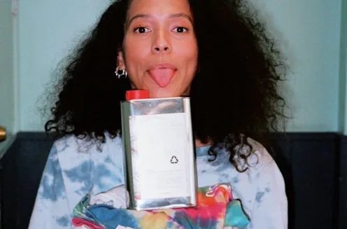 DedCool's new Milk Dedtergent with model.