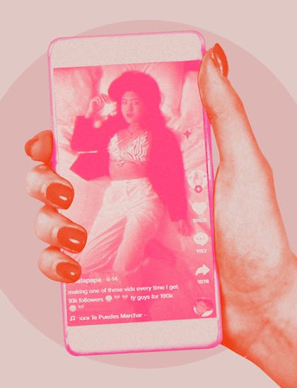 A pink hand holds an iphone with a screenshot of an #AltLatinx TikTok video.