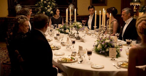 The Crawley family sit around the Christmas dinner table