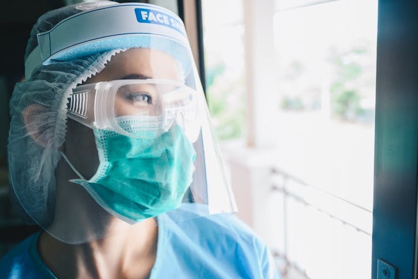 Health-care workers may wear face shields to prevent splashes of bodily fluids