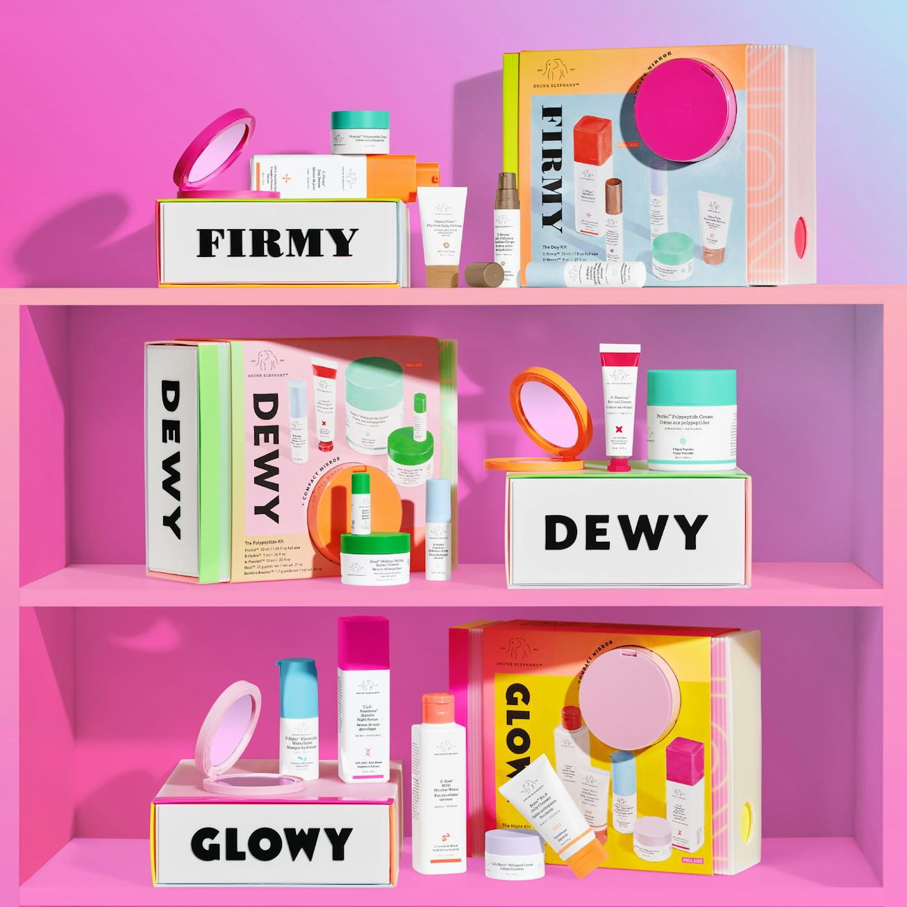 Dewy, Firmy, and Glowy beauty product collection on pink shelves