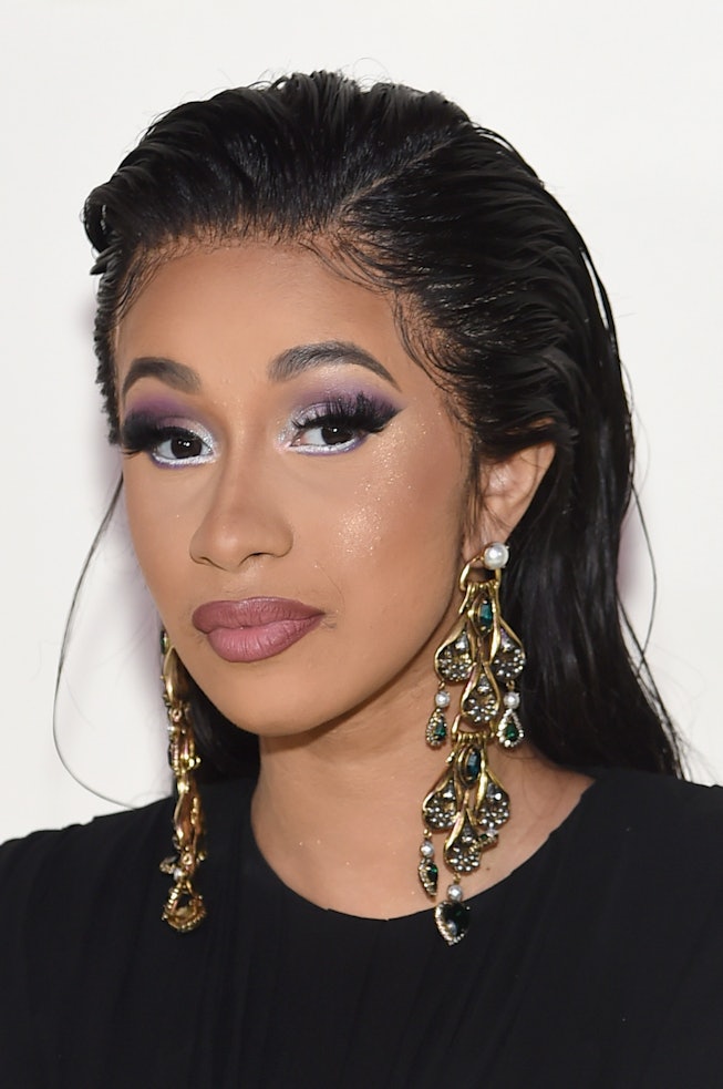 Cardi B Showed Off A Louis Vuitton-Imprinted Ponytail On Instagram