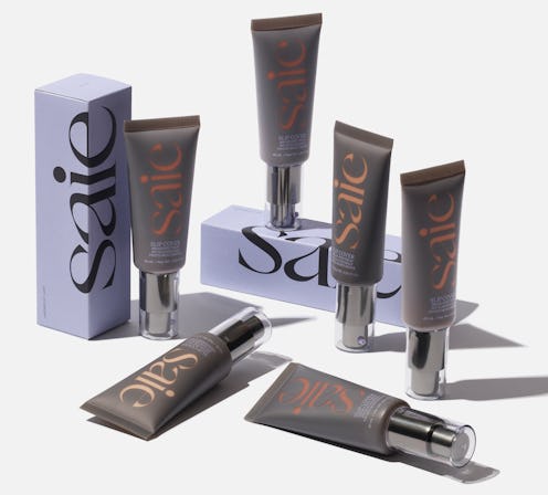 Multiple shades of Saie Slip Cover in bottle.