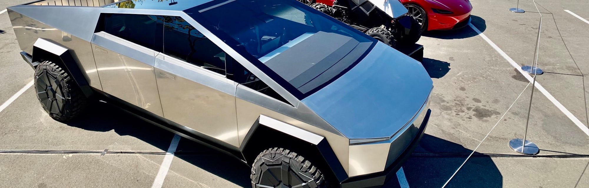 tesla cyberquad roadster and cybertruck look stunning in rare public photo