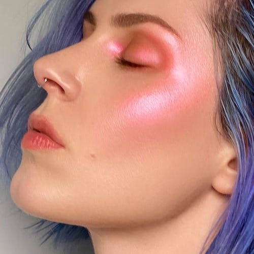 Rituel de Fille's The Dream Metamorphic Highlighter swatched on model.