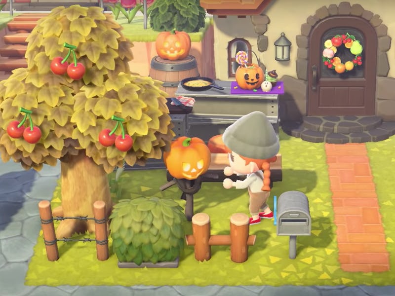 An Animal Crossing character is seen tending to her pumpkin in the garden.