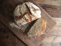 Rustic sourdough bread loaf on a cutting board