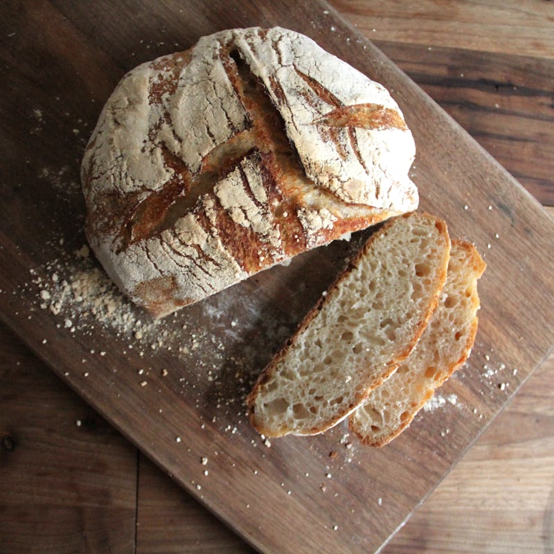 Rustic sourdough bread loaf on a cutting board
