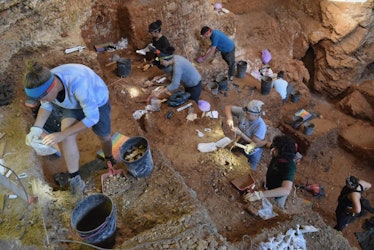 Researchers excavating at Portugal's Lapa do Picareiro