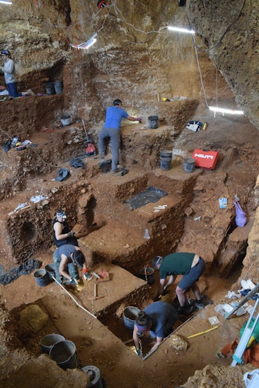 Researchers excavating at the Portuguese cave called Portugal's Lapa do Picareiro
