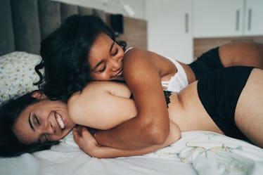 Lesbian couple in bed