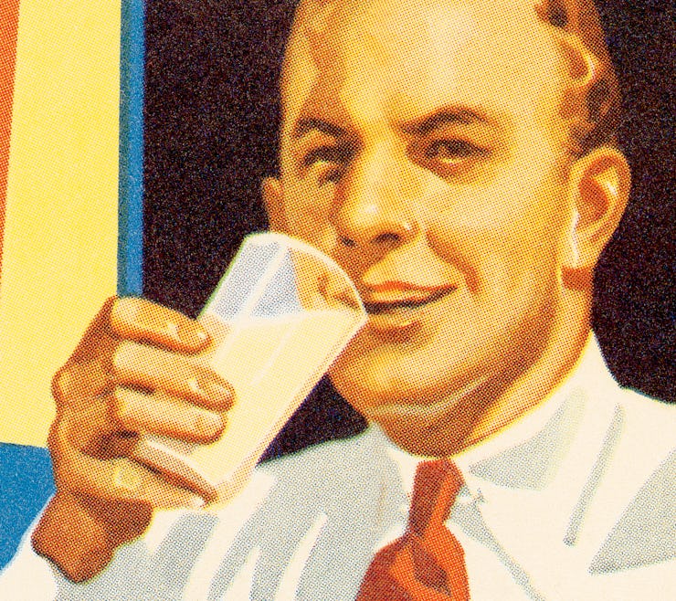 Man with glass of milk.