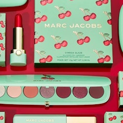 Lipstick, eyeshadow palette, and mascara from the limited-edition Marc Jacobs Beauty Very Merry Cher...
