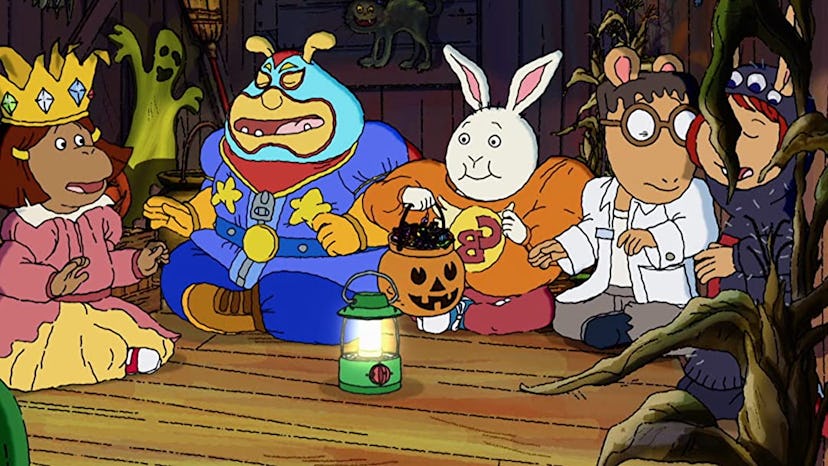 Still from 'Arthur and the Haunted Tree House'; kids sitting in a tree house in their Halloween cost...