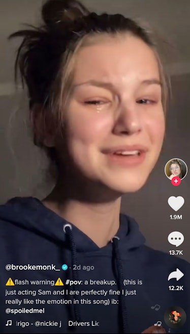 A girl cries while singing to "driver's license" on TikTok. 