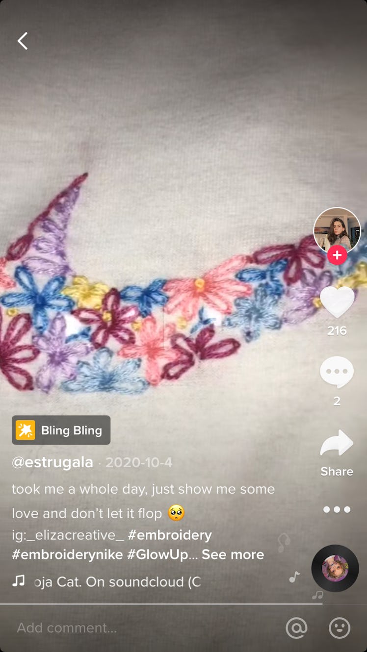 @estrugala makes a floral nike logo embroidery.