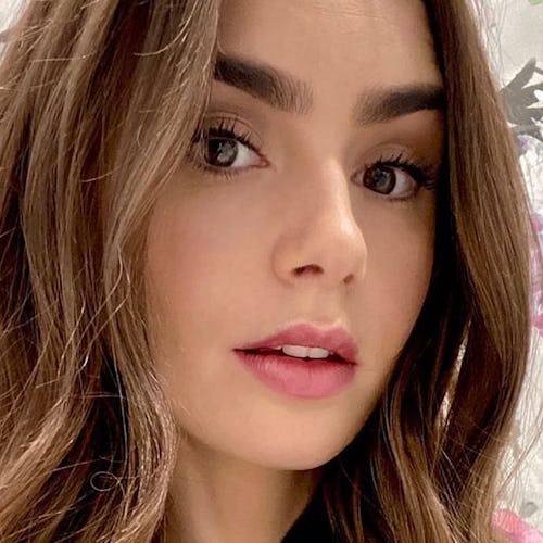 Lily Collins has posed in front of many floral and palm-print wallpapers