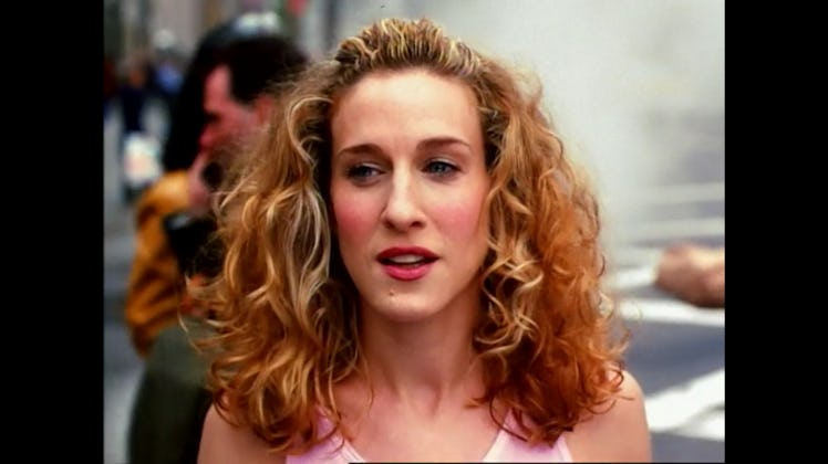 Carrie Bradshaw, played by Sarah Jessica Parker, walking the New York City streets in the "Sex and t...