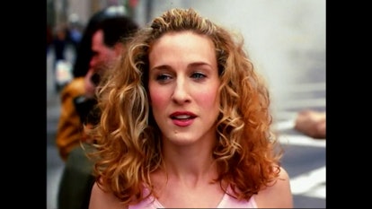 Carrie Bradshaw, played by Sarah Jessica Parker, walking the New York City streets in the "Sex and t...