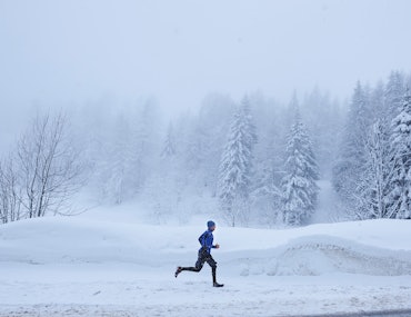 man running in snow