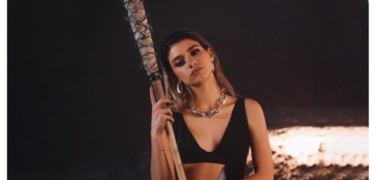 Dixie D'Amelio appears in her 'One Whole Day' music video.