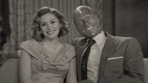 Wanda and Vision smiling into the camera on 'Wandavision' via the Disney+ press site